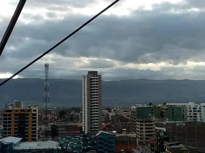 a view of a city with mountains in the background at depacentrohuancayo in Huancayo