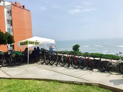 a row of bikes parked next to a fence at Barranco Best Location - Apartment wAC in Lima