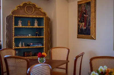 a dining room with a table and chairs at Inkantari Boutique Hotel in Cusco