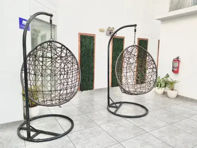two metal baskets sitting on top of a tile floor at Exclusivo con vista panorámica al mar - Ocean View in Lima