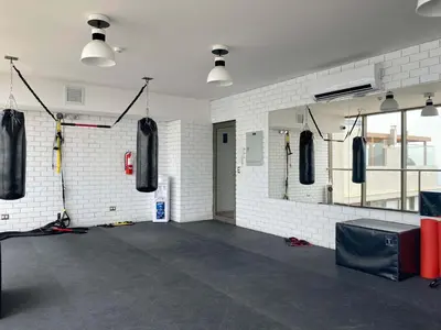 a large room with a room with rubber mats at The Modern by Wynwood House in Lima
