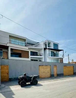 a wheeler parked in front of a building at Almar Punta Hermosa in Punta Hermosa