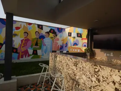 a wall with a mural of a train on it at Loft de estreno, San Borja, muy centrico in Lima
