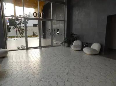 a large room with white floors and a large window at Loft de estreno, San Borja, muy centrico in Lima