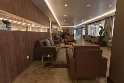 a lobby with couches and chairs in a building at Hotel Presidente Huancayo - Asociado Casa Andina in Huancayo