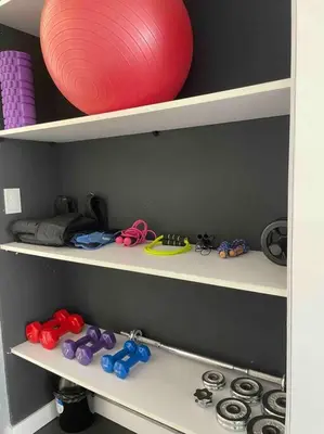 a shelf with a red ball and other items on it at Sky1004 in Lima