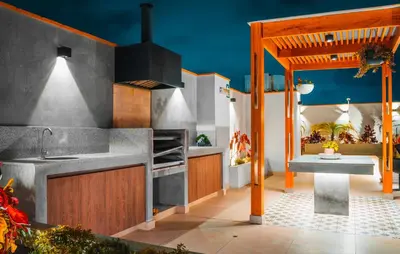 an outdoor kitchen with a sink and a stove at Apartamento de Ensueño LINCE in Lima