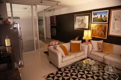 a living room with two couches and a lamp at Chic Miraflores AC HEATER 16th floor in Lima