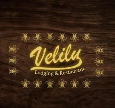 a sign with the name ofvalley on a wooden wall at Hospedaje Hamuy's Lodge in Ica