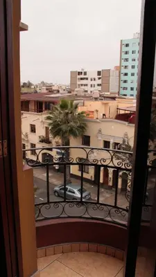 a view of a city from a balcony at Pretty House Hotel in Lima