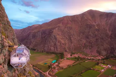 an aerial view of a mountain with a house on it at Skylodge Adventure Suites in Urubamba