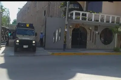 a military truck parked in front of a building at Hostal Luren in Nazca
