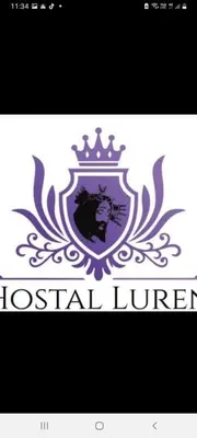 a logo of a crest with a lion and a crown at Hostal Luren in Nazca