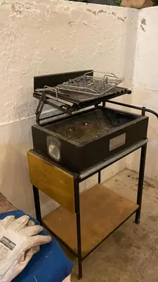 a grill sitting on top of a table at Casa de Campo - Fundo Raquel in Ica