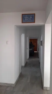 a hallway with a car parked in a garage at CASA DE PLAYA Durante todo el año in Punta Negra