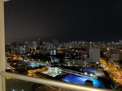 a view of a city at night with lights at Mousse PL in Lima