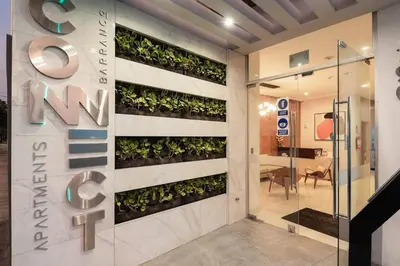 a vertical garden on a wall in a lobby at Peruvian Apartments Barranco 904 in Lima