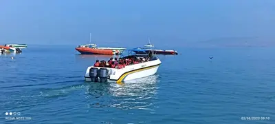 a group of people on a boat in the water at ALOJAMIENTO ISLA BLANCA in Paracas