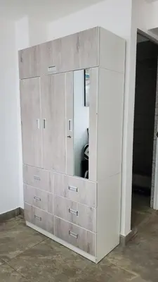 a dresser with a mirror in a room at Sanbar House in San Bartolo