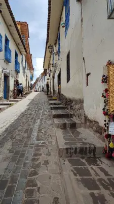 an empty street in a town with buildings at QORI, apartamento nuevo Centro Histórico de Cusco, Cuesta San Blas 561 in Cusco