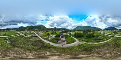 an aerial view of a village with mountains in the background at La casa de Anni - Departamento 1 in Oxapampa