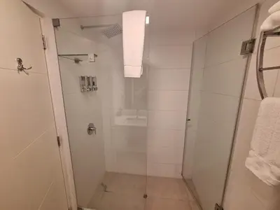 a bathroom with a shower and a sink at Gorgeous 2BDRM with A/C - Miraflores in Lima