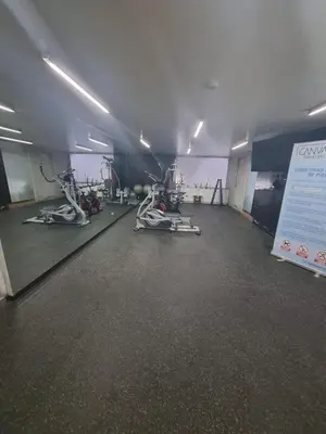 a gym with two exercise bikes in a room at Gorgeous 2BDRM with A/C - Miraflores in Lima