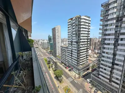 an aerial view of a city with tall buildings at Departamento exclusivo a un paso de San Isidro in Lima