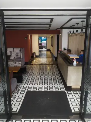 a hallway with a tile floor in a restaurant at Refugio en Barranco, Private Apartament in Barranco in Lima