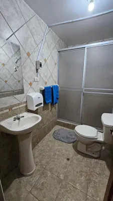 a bathroom with a sink and a toilet and a shower at Casa Independiente cerca al Centro en Segundo Piso - Los Profesionales in Cusco