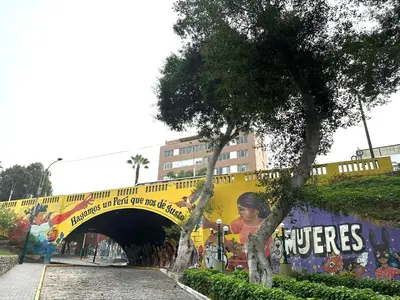 a bridge with a mural on the side of it at Friendly Apartment Tamayo in Lima