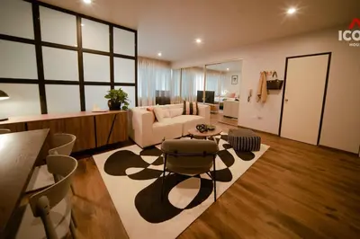 a living room with a couch and a table at Designed Studio in Miraflores / Amazing View in Lima