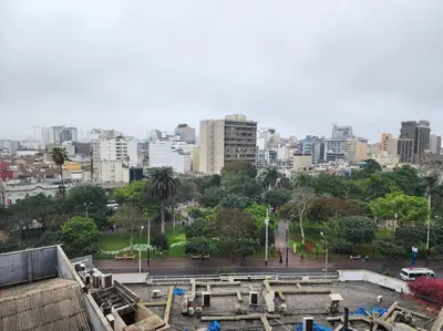 a view of a city with buildings in the background at Designed Studio in Miraflores / Amazing View in Lima