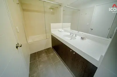 a bathroom with a sink and a mirror at Beautiful 2BR in Miraflores in Lima