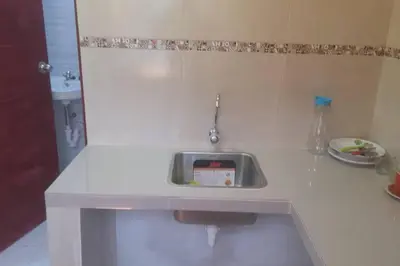a white counter with a sink in a bathroom at 202 Comfy Apt WiFi kitchen SmartTV Central at Callao in Lima