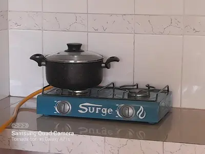 a pot on top of a stove in a kitchen at 202 Comfy Apt WiFi kitchen SmartTV Central at Callao in Lima