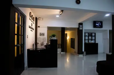 a lobby of a building with a reception desk at Hotel Ferré Machu Picchu in Machu Picchu