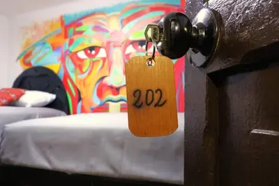 a tag on the door of a room at Millas House Cusco in Cusco