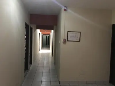 a hallway of a building with a hallwayngthngthngthngthngthngthngthngth at Hostal La Cascada in Lima