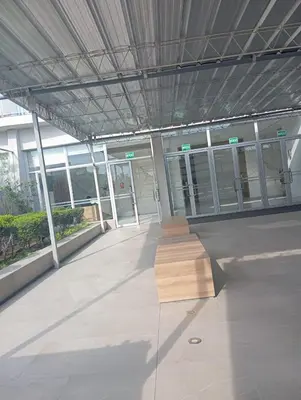 a building with a wooden bench in the middle at Departamento en el edificio más alto del Perú, a 10 min de Plaza de Armas in Lima