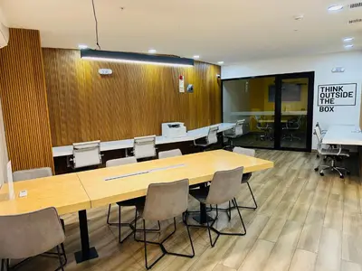 a conference room with a large wooden table and chairs at 1Br AC San Isidro Apartment in Lima