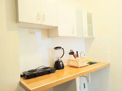 a kitchen counter with a blender on top of it at Departamentos Céntricos en Lima in Lima
