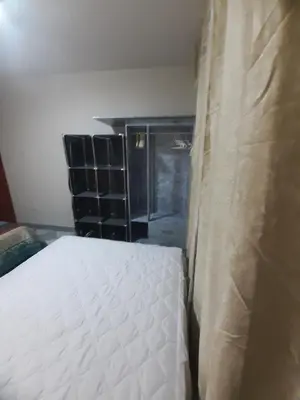 a bedroom with a bed and a window in a room at Just for me in Lima