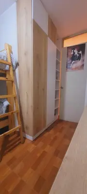 a room with a bunk bed and a closet at Departamento cerca al Centro Histórico de Lima in Lima