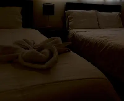 two beds sitting next to each other in a room at Casablanca Lima in Lima