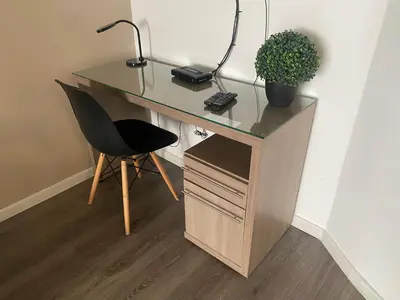 a desk with a black lamp and a black chair at Enjoy Lima in a Renovated and Private Apt D in Lima