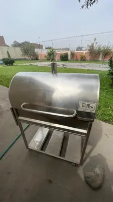 a stainless steel appliance with a plate on it at Casa Grande de Campo en Huachipa in Lima