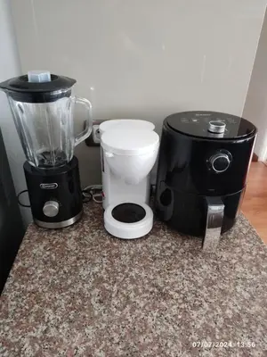 a blender and a blender sitting on a counter at Adriane in Lima