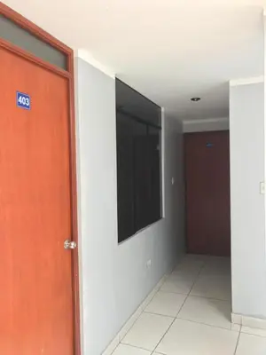 a room with a flat screen tv on a wall at Hospedaje D Francisco in Lima