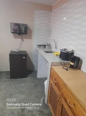 a kitchen with a counter and a sink and a counter top at 201 Comfy Apt WiFi kitchen SmartTV Central at Callao in Lima